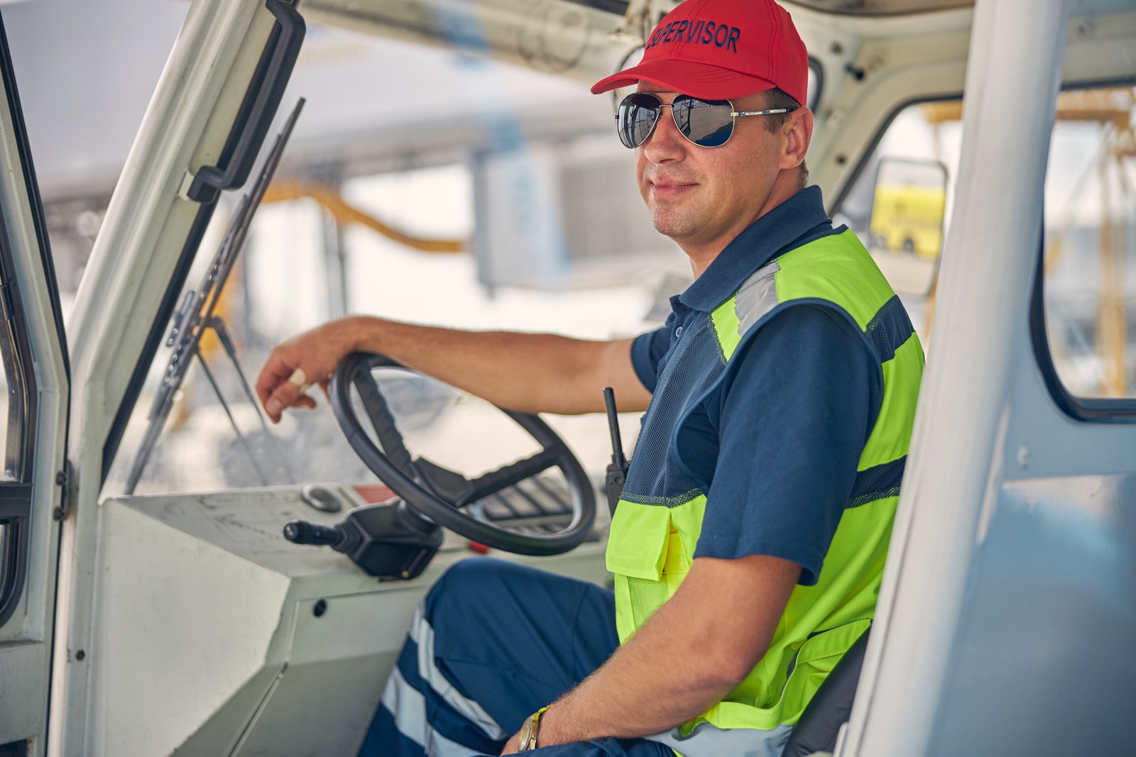 Truck driver in the cab of his vehicle